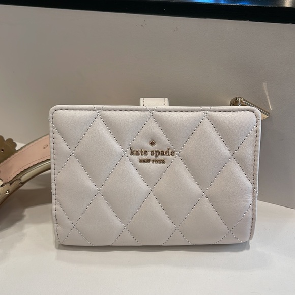 Kate Spade Carey Medium Compartment Bifold Wallet 
COLOR: Parchment - Picture 11 of 16